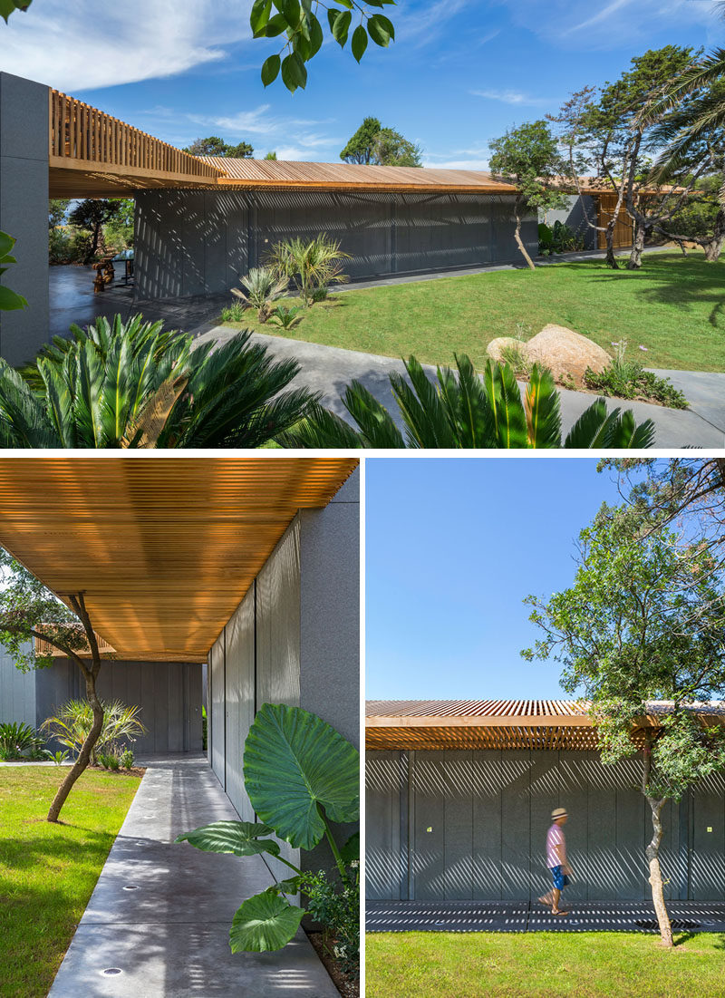 This modern villa has covered pathways that lead to the other areas of the villa, like the bedrooms.