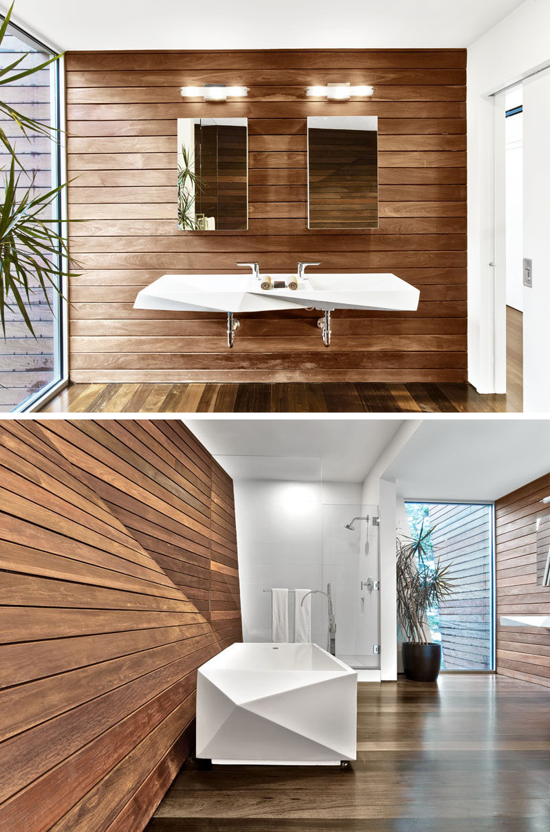 This master bathroom has been designed to be warm and intimate with an almost Swedish sauna-like appearance, with the jewel-like Crystalline Bath tub and sink faceted to mimic the overall design of the space.