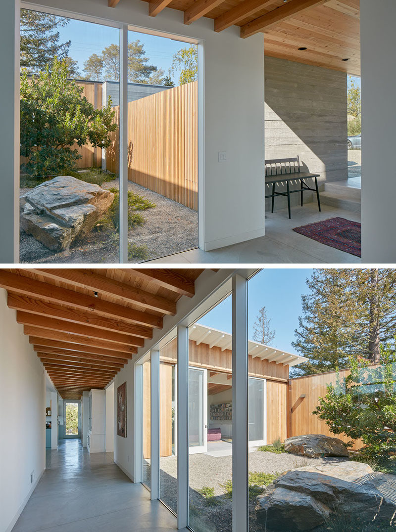 Once you enter this contemporary home, you can see the small courtyard and the family room that divides the living and sleeping areas.