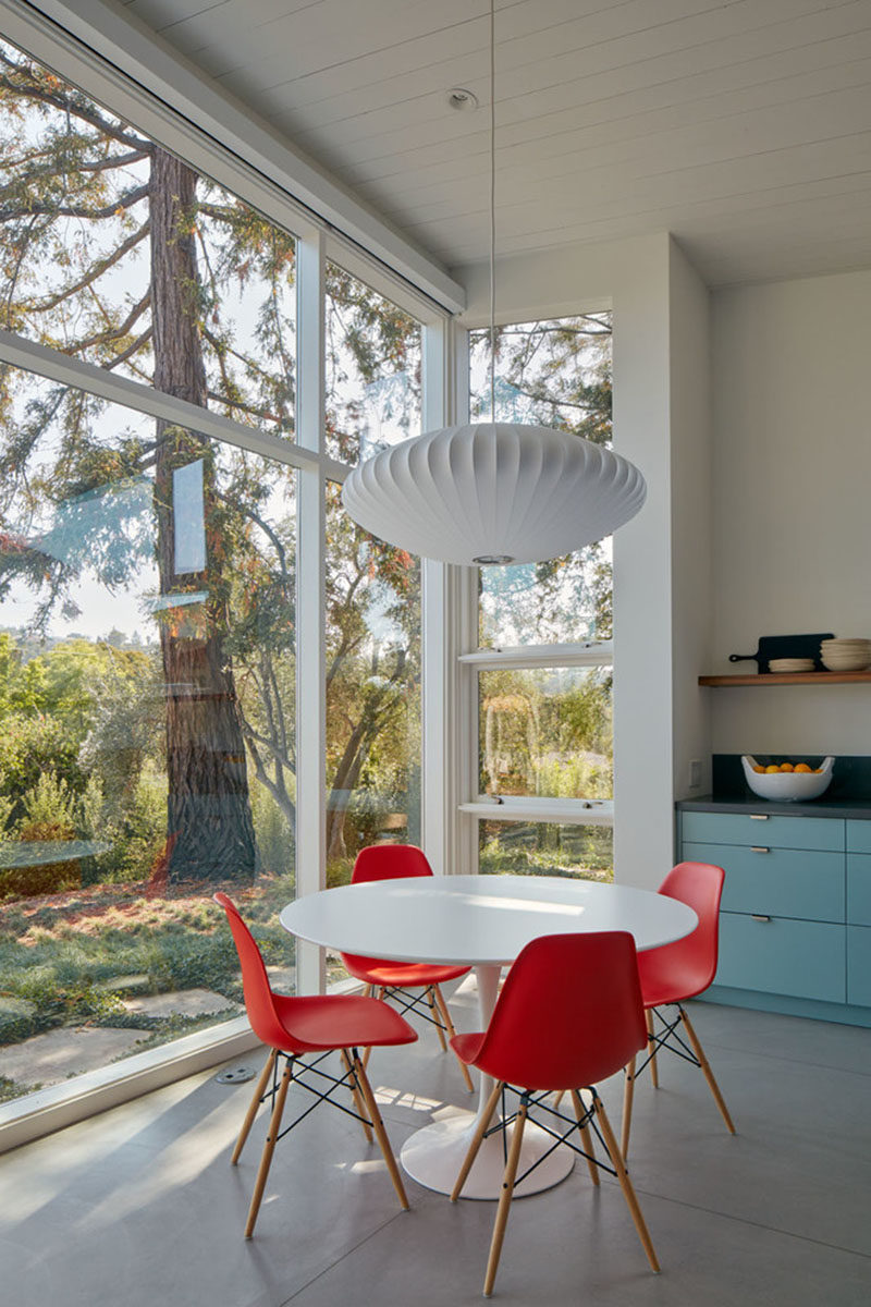 This small dining area that has been set up with a mid-century modern look..