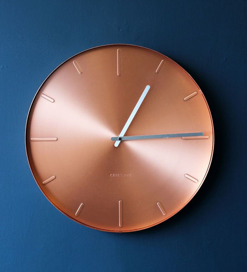 Kitchen Decor Ideas - 12 Ways To Add Copper To Your Kitchen // Keep track of your time in the kitchen with a copper clock that adds shine and sophistication to the space.