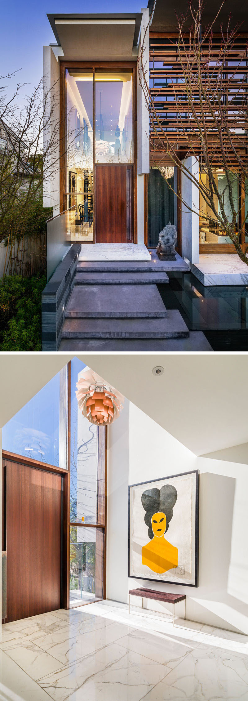 Stone steps, a water feature and a wooden door with large wood-framed windows welcomes you to this home, and inside white walls and colorful artwork fill the foyer.