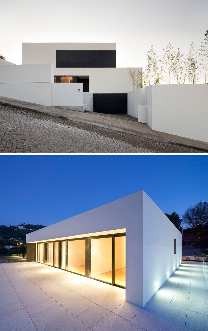 House Exterior Colors - 11 Modern White Houses From Around The World // The clean lines of this white house and it's position on a cobbled street make it look exceptionally modern.