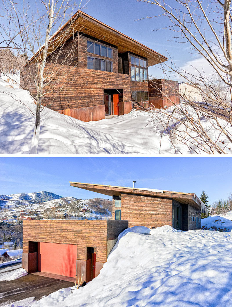 16 Examples Of Modern Houses With A Sloped Roof | The sloped roof on this modern house is angled backwards to maximize natural light inside while enabling snow and rain to drain off at the back.