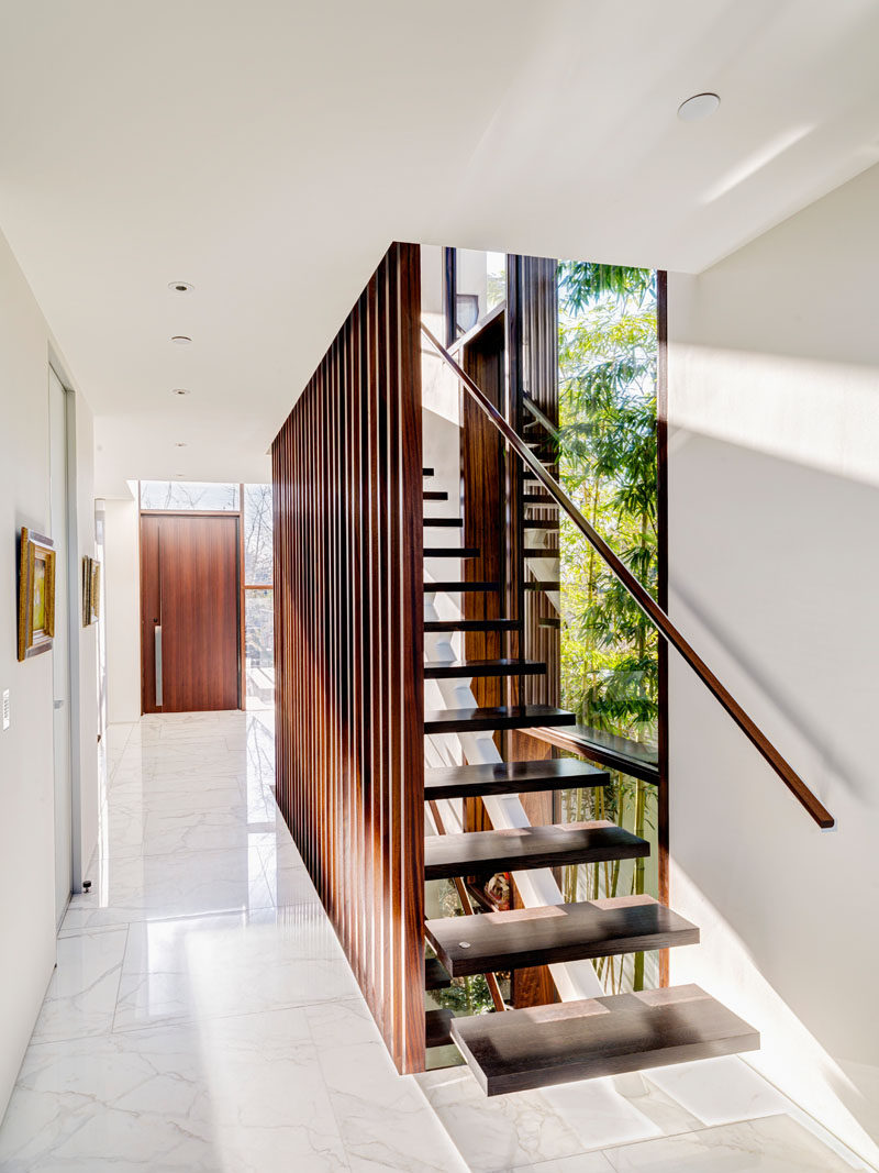 Timber Slats Cover The Upper Floor Of This Contemporary 