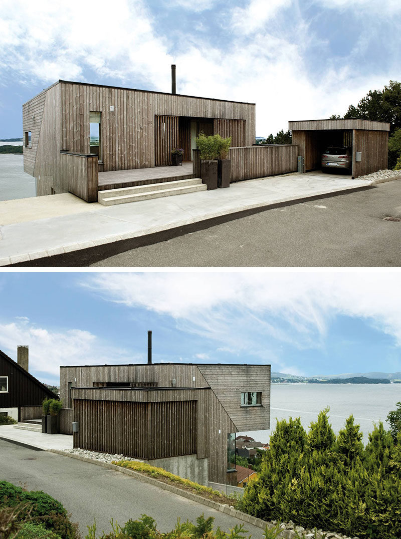 19 Examples Of Modern Scandinavian House Designs | Weathered wood siding covers the home, the fences, and the garage to create a cohesive looking exterior that's modern, warm, and inviting.