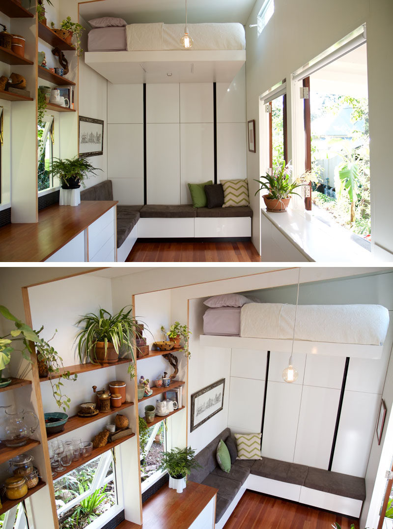This custom designed tiny house has a small deck, a comfortable lounge, a kitchen with a fold out table, a retractable bed, a relaxing loft area.
