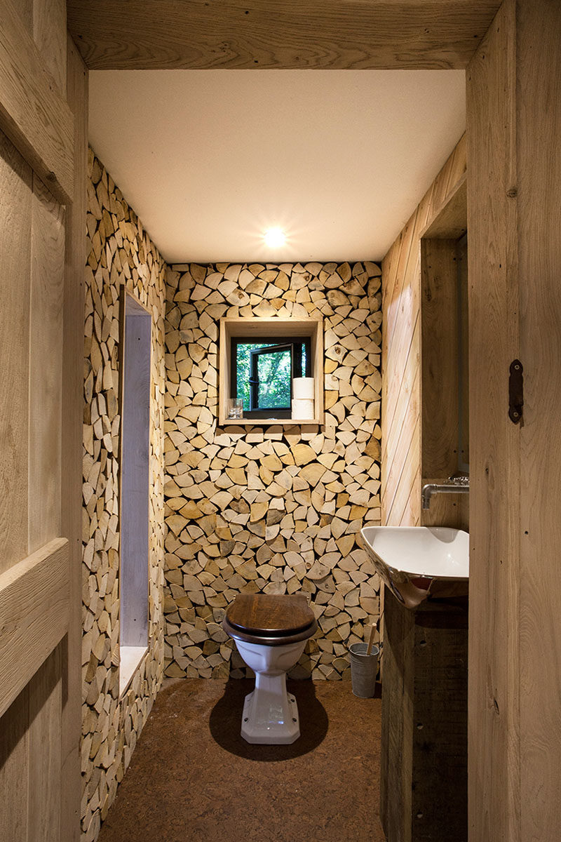 This small washroom is part of a grown-up two-storey modern treehouse.