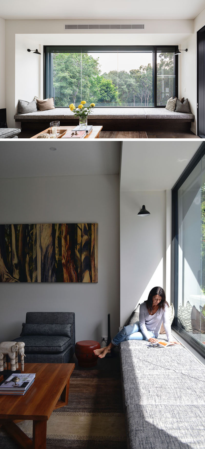 This cushioned window seat runs the length of the window and overlooks the bush outside.