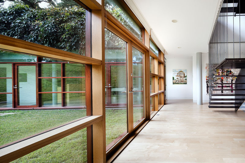 On the lower level of this home, wood frames surround the windows and doors.