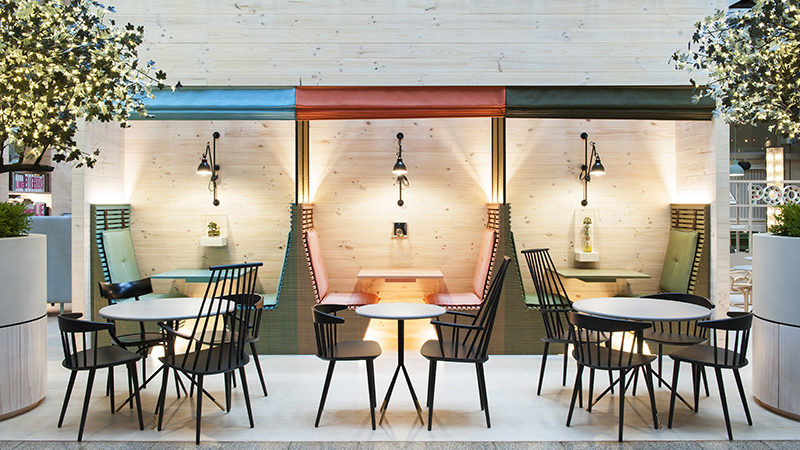 Interior Design Idea – Sometimes, people need a little privacy for a phone call, dinner or discussion when in a public space, especially in a hotel, and one way that can be achieved is by installing drop-down shades. Not only do the shades provide privacy for each booth, they also match the colorful upholstery and furniture within the booth.