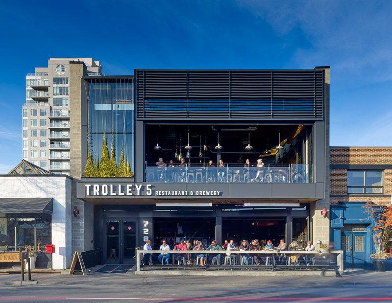 Modern Office of Architecture and Design (MODA) have completed Trolley 5 Restaurant & Brewery, a brew pub full of industrial elements on a popular street in Calgary, Alberta.