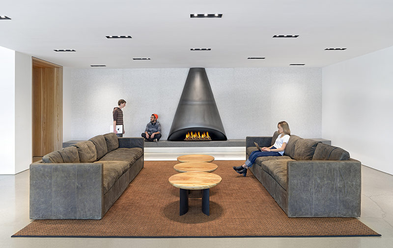 Modern Fireplace Surround Ideas - This cone-shaped black steel design would look great in any living room