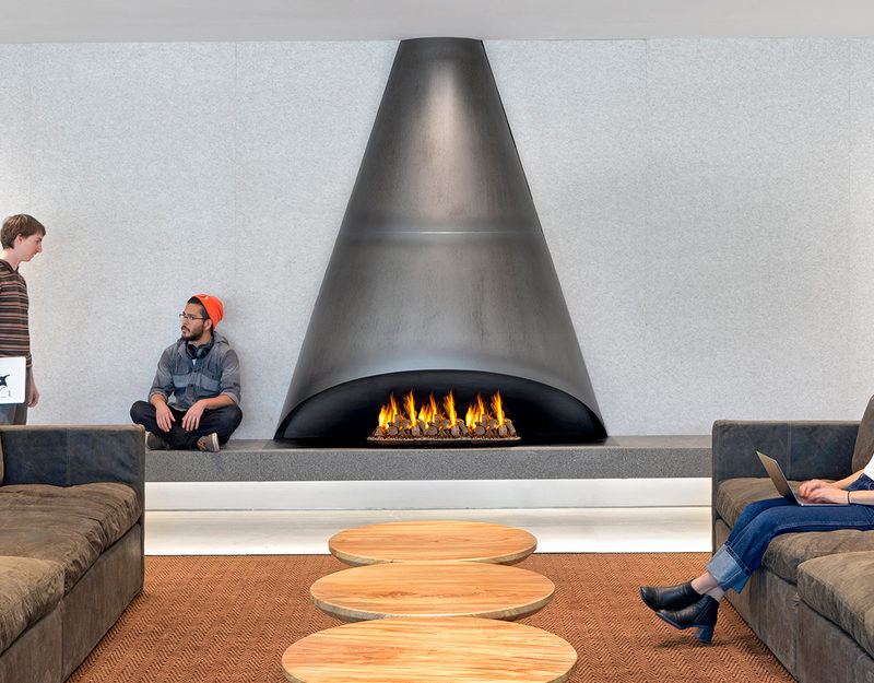 Modern Fireplace Surround Ideas - This cone-shaped black steel design would look great in any living room