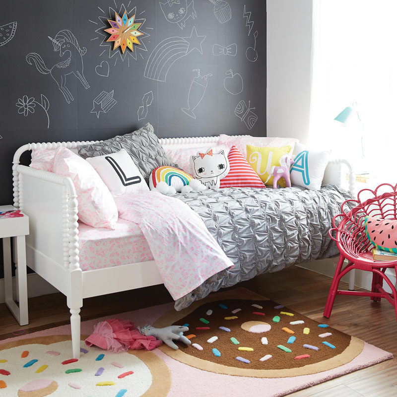 In a cute girl or tween bedroom, create a chalkboard wall as a space for wall art or to create an accent wall.