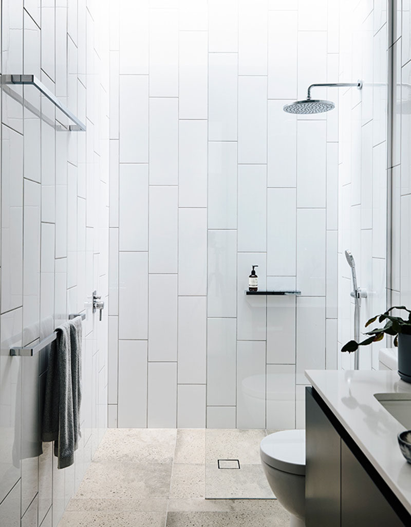 Bathroom Tile Design Idea - Oversized Subway Tiles Installed Vertically Instead Of Horizontally
