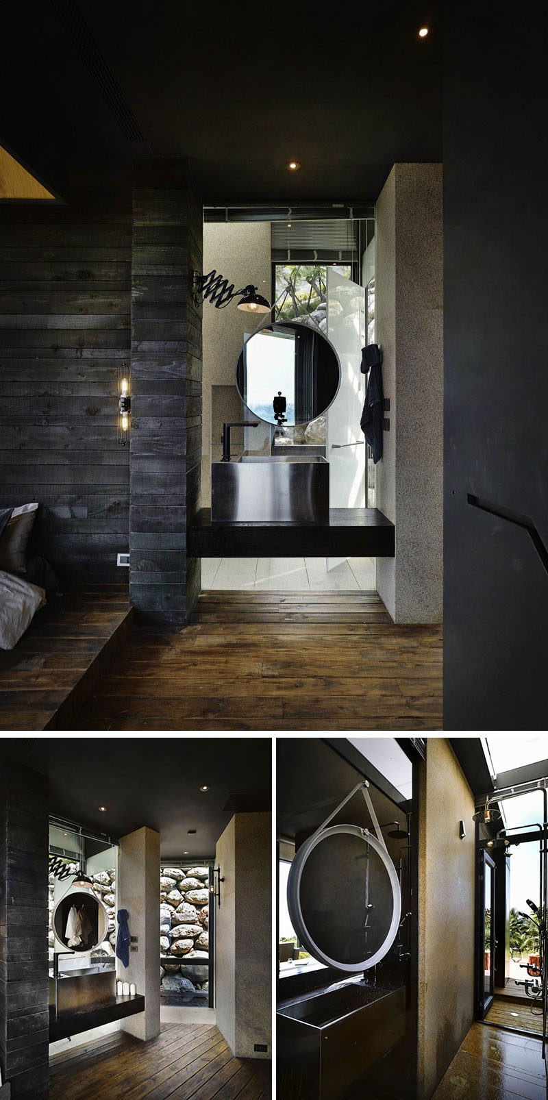 In this modern bathroom, a round mirror is hung above the aluminum sink and wooden vanity. Around the corner from the vanity is the shower that gets plenty of natural light from the skylight and door leading outside.