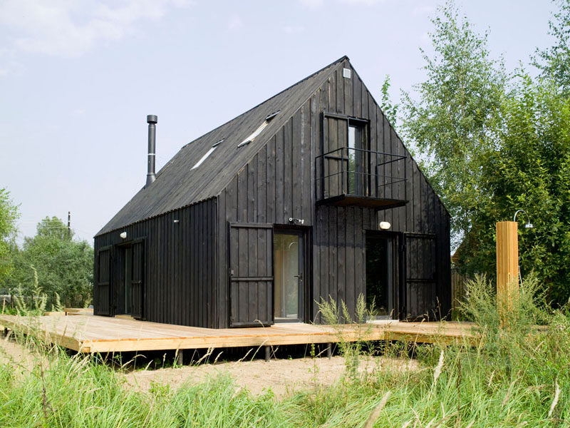 House Exterior Colors – 14 Modern Black Houses From Around The World / This entirely black home sits in a secluded field and acts as a retreat from busy everyday life.