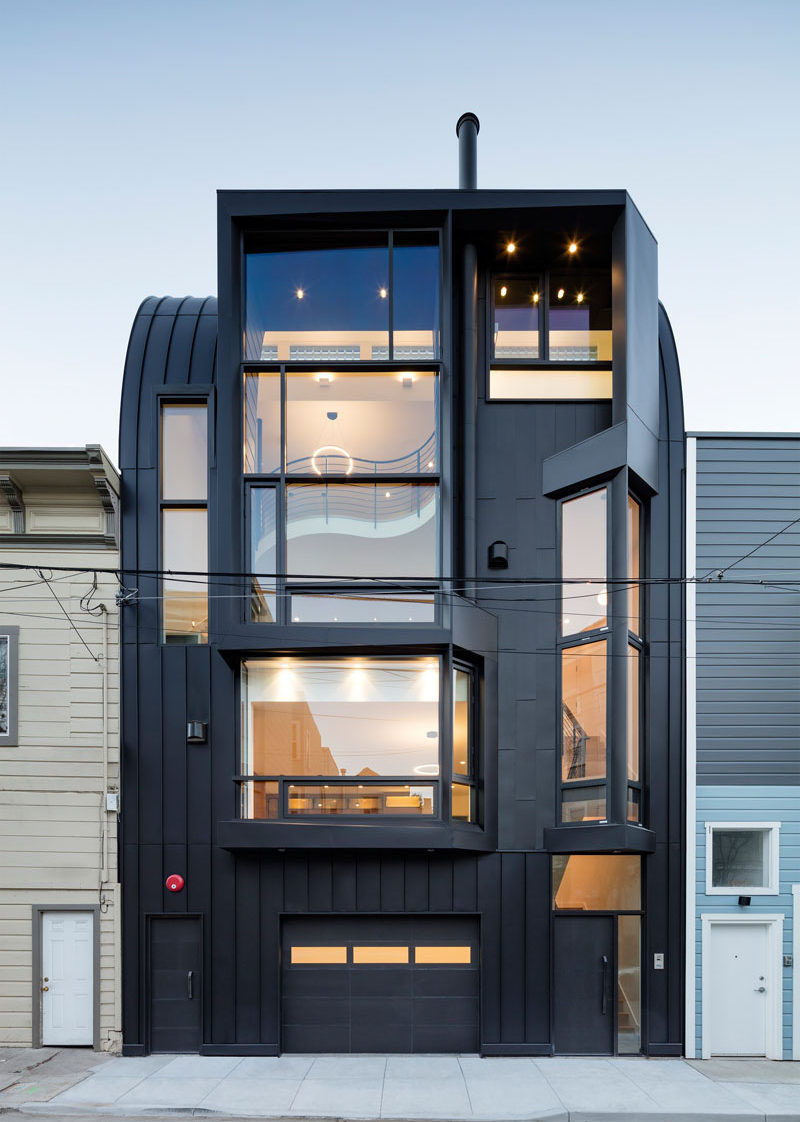 House Exterior Colors – 14 Modern Black Houses From Around The World / Two apartments are housed in this striking building with an all black facade.