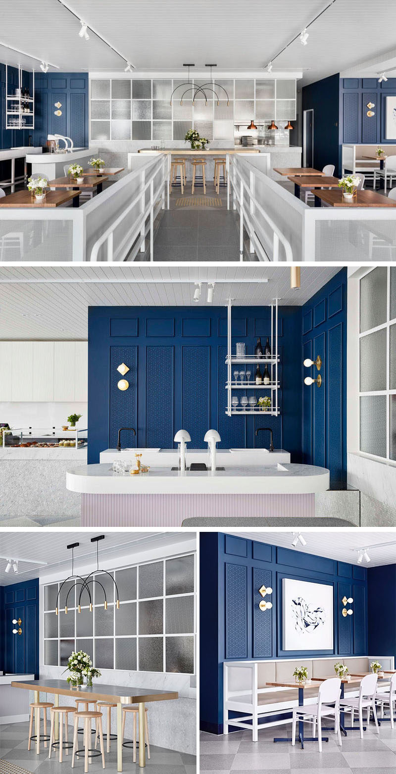 This contemporary coffee shop features royal blue walls with white and light pink accents.