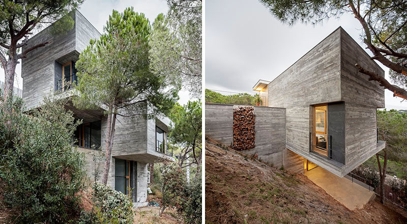 13 Modern House Exteriors Made From Concrete | Tucked into the hillside and surrounded by trees, this concrete home adds an industrial look to the area while also blending in to the landscape.