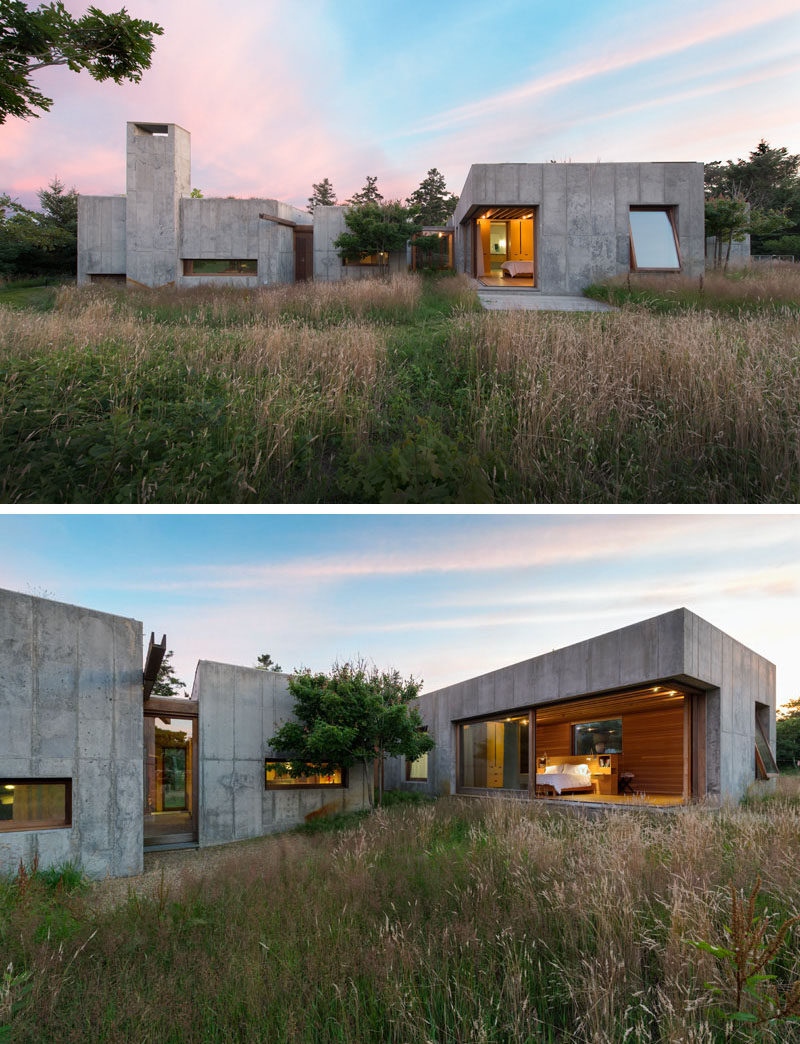 13 Modern House Exteriors Made From Concrete | This concrete house surrounded by nature has been designed to make the most of the landscape, and features sliding doors and tilting windows to make it easy to feel outside even when you're in bed.