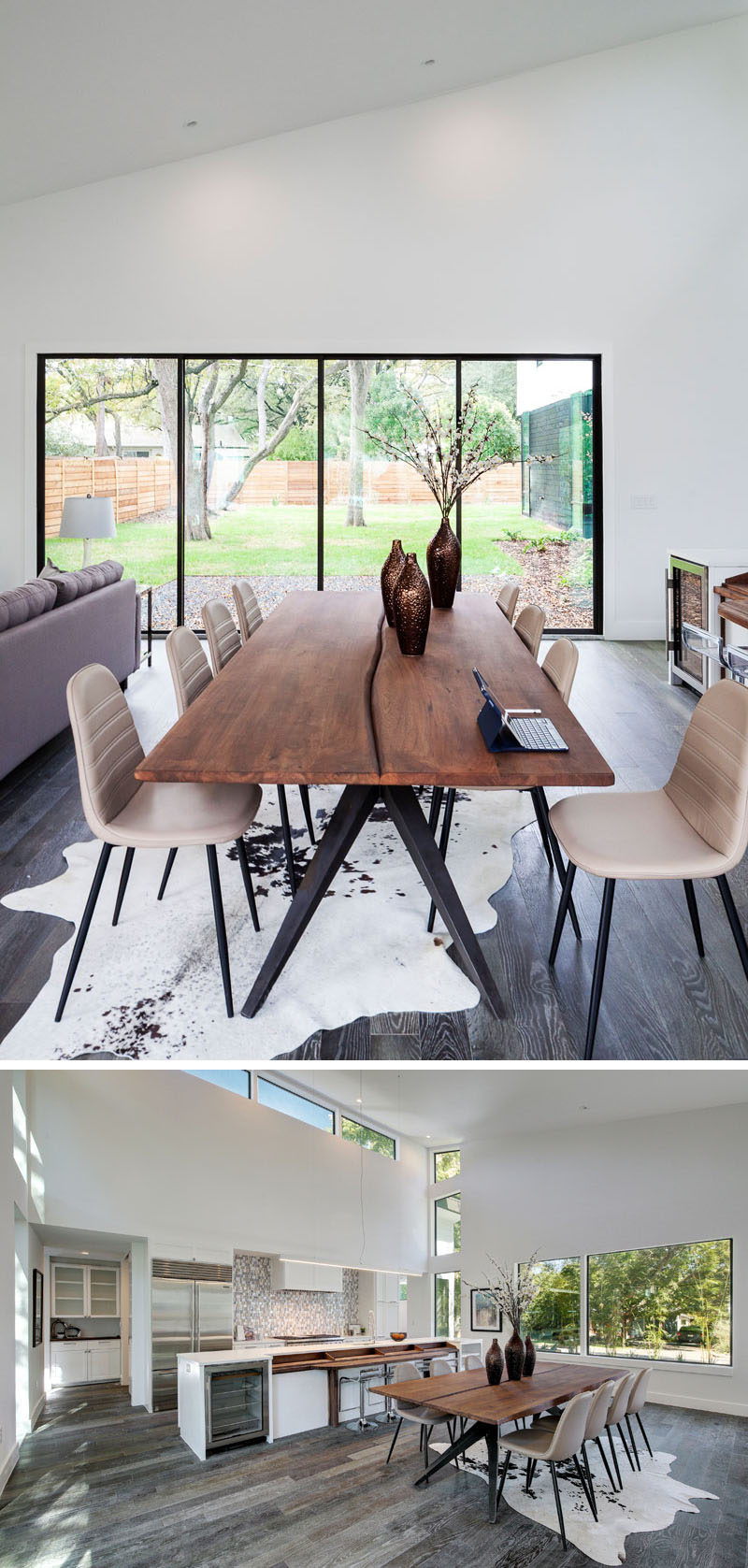 The interior of this modern house has a dining area with views of the backyard, and the wood dining table ties in with the tall trees outside.