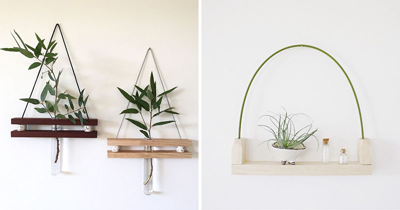 These modern hanging wall shelves made from reclaimed wood have a ledge to display a little trinket and a bud vase for a flower.