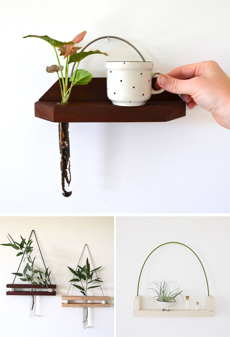 These modern hanging wall shelves made from reclaimed wood have a ledge to display a little trinket and a bud vase for a flower.