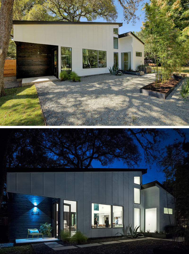 At the front of this modern house in Austin, Texas, simple gravel and grass landscaping has been broken up by rectangular steel planters, while dark wood has been used to highlight the home's entrance.