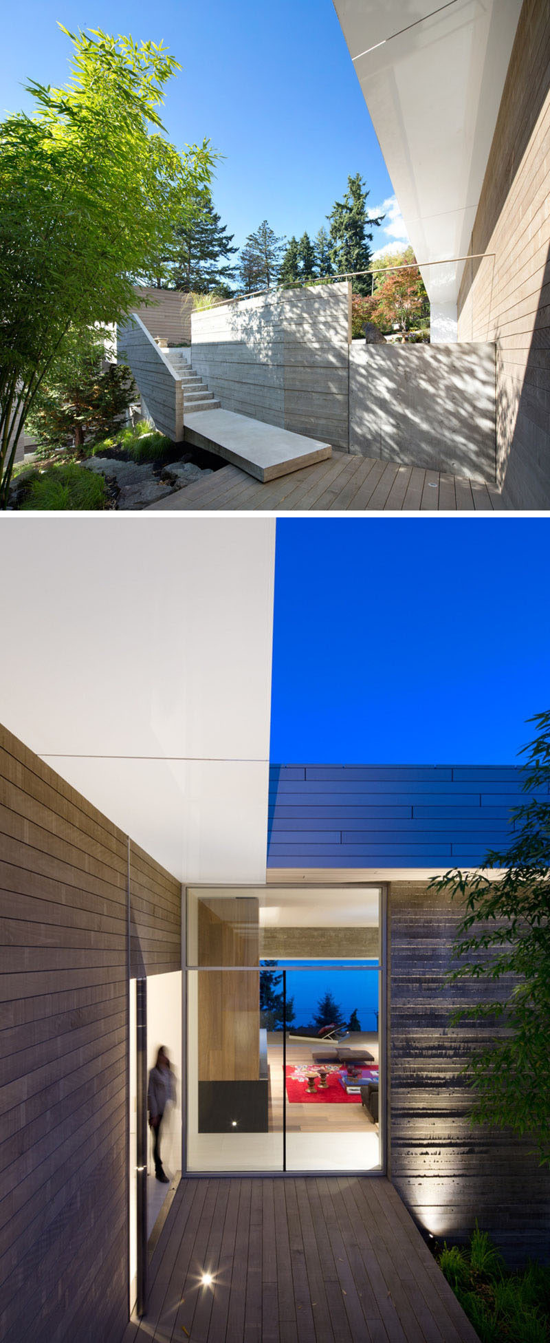 At the front of this modern house, concrete stairs lead you to a wood deck and garden that has views of the modern interior through large windows.