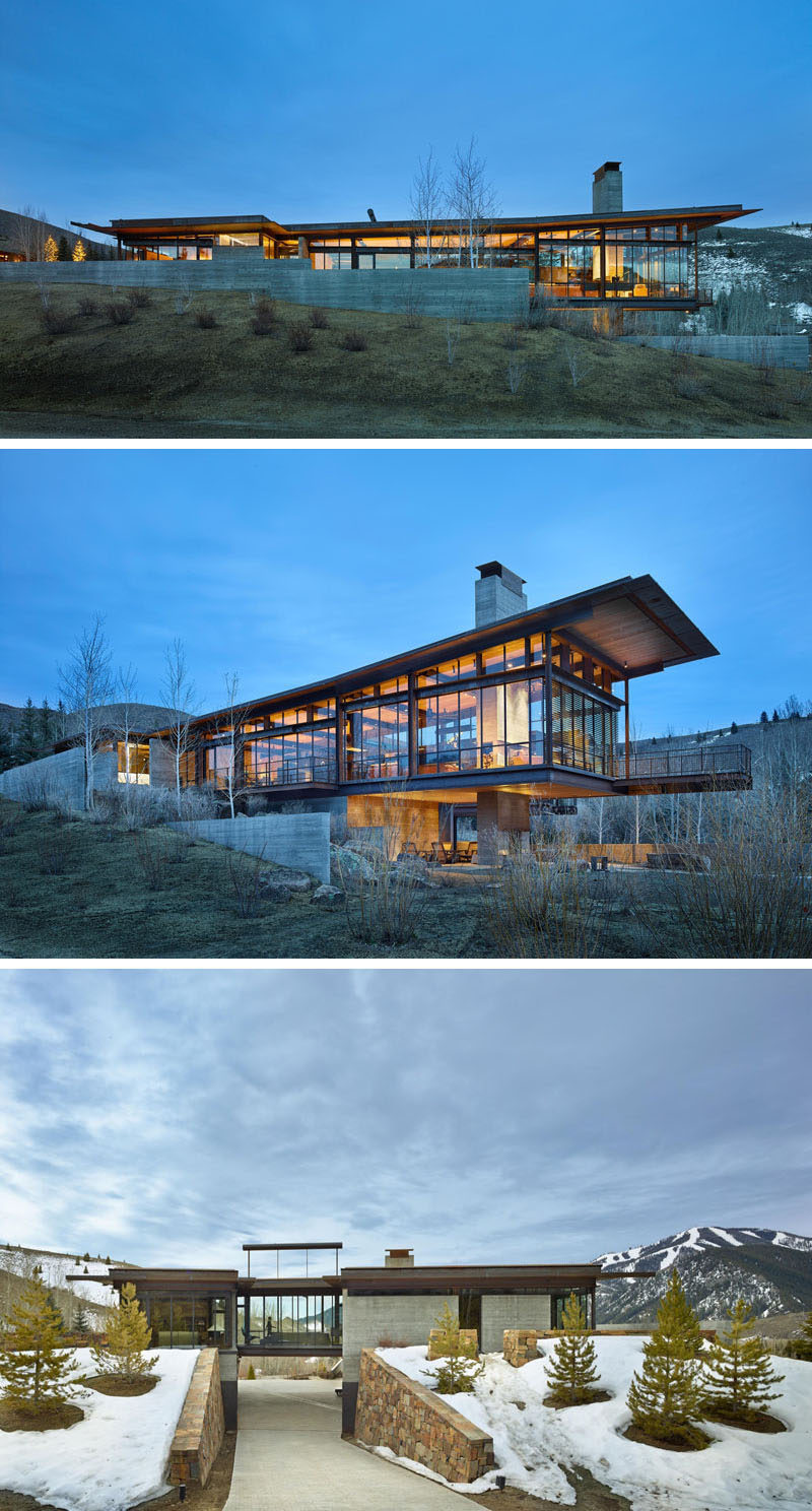 Architecture firm Olson Kundig have designed this modern industrial house in the mountains of Idaho, that has a 25ft pivoting glass wall that opens using a counterbalance.