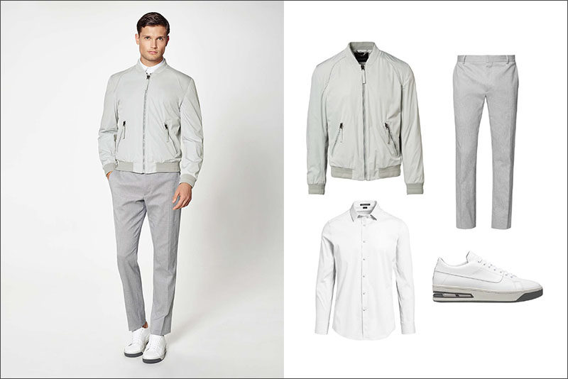 Men's Fashion Ideas - 17 Men's Outfits From Porsche Design's 2017 Spring/Summer Collection | This sophisticated yet casual men's outfit was created using a simple light grey jacket, a pair of light grey trousers, a crisp white collared shirt, and clean white sneakers.