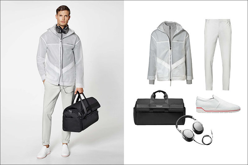 Men's Fashion Ideas - 17 Men's Outfits From Porsche Design's 2017 Spring/Summer Collection | A white and light grey jacket, a pair of cotton blend pants, a pair of white sneakers with a red stripe, a 2-in-1 weekender and garment bag, and a pair of metallic headphones create a clean looking men's outfit.