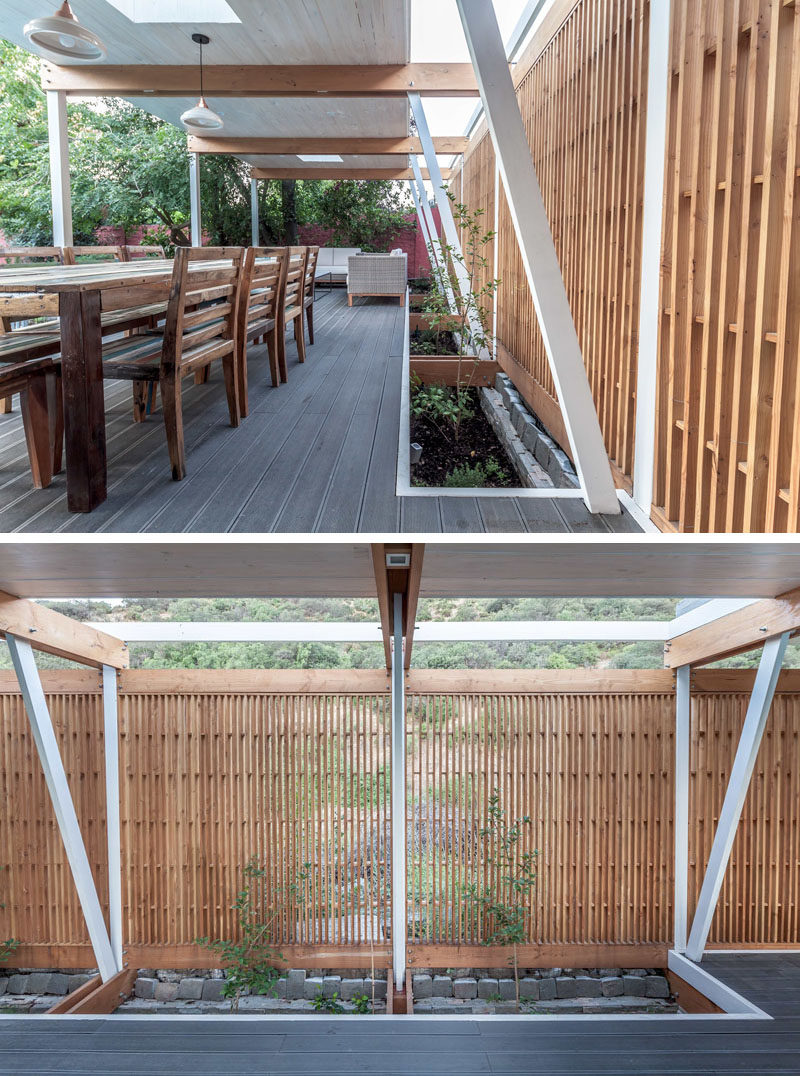 This modern pool house has a wooden screen to provide privacy without blocking the sunlight.