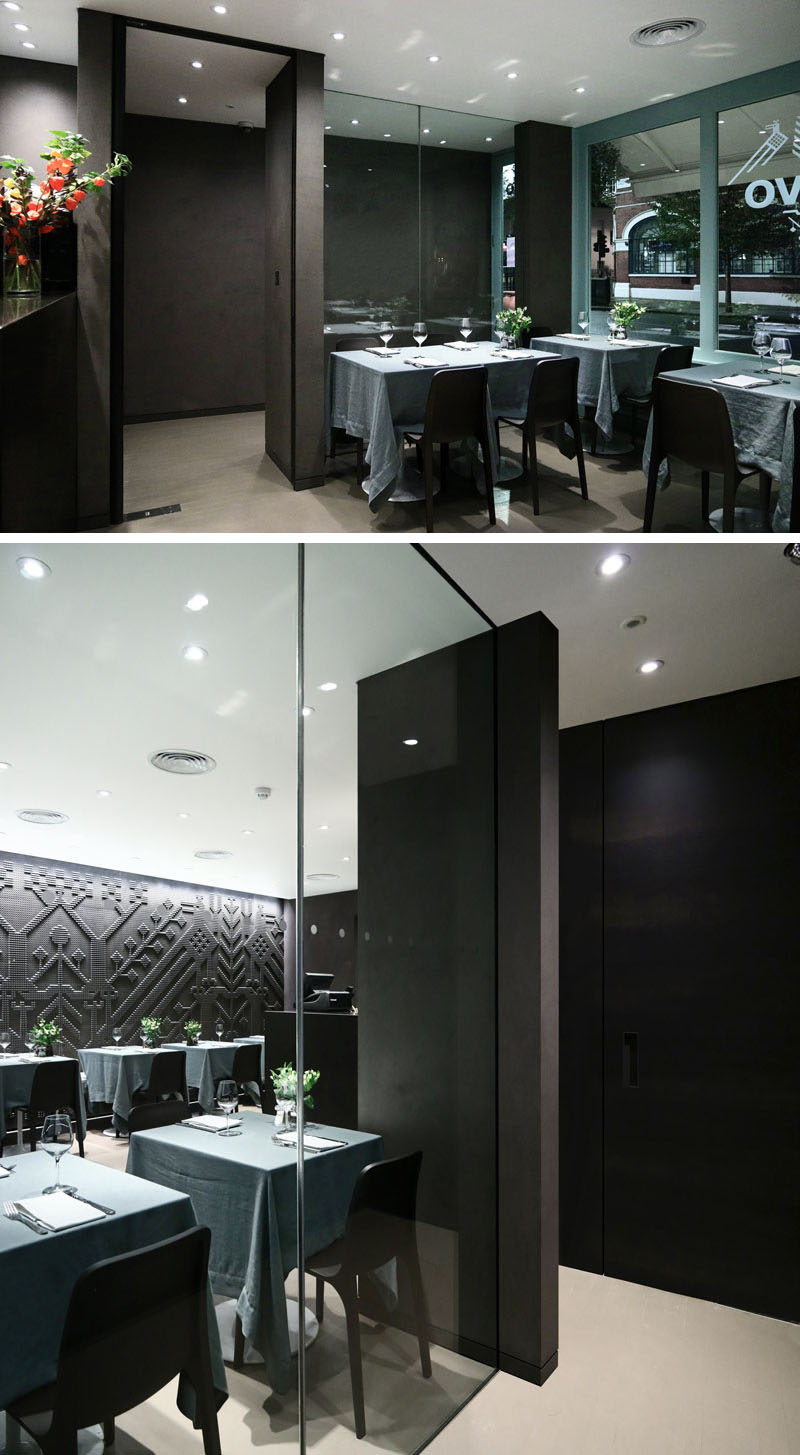 Upon entering this restaurant, you step into a small lobby area with a full height glazed wall, dividing the space from the main dining area. This glazed wall replaces what was once a solid wall, making the lobby more open and visually interesting.