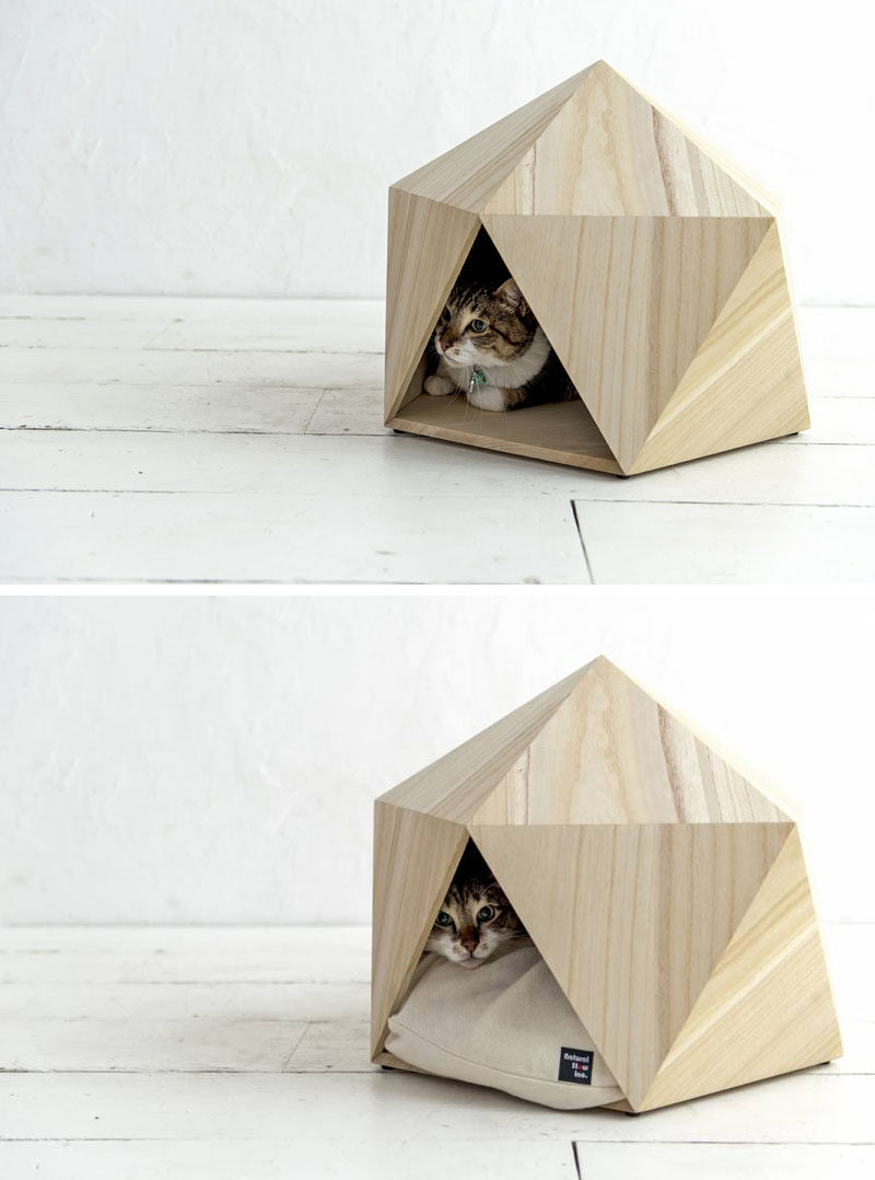 This small unique and modern pet bed made from wood is the perfect cat cave