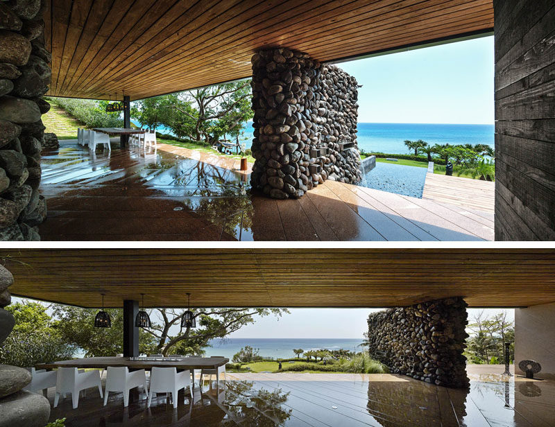 This alfresco dining room in a modern house is open to the outdoors and has uninterrupted views of the Pacific Ocean. A wood lined ceiling provides protection from the sun and rain.