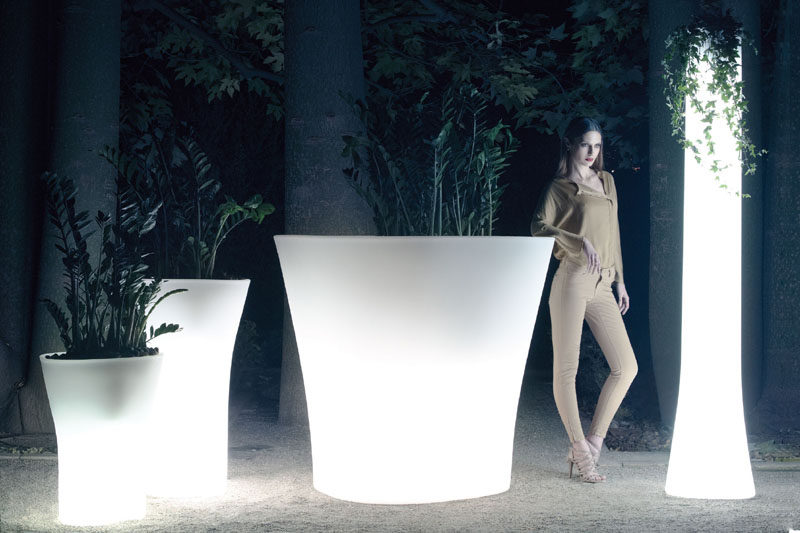 8 Outdoor Lighting Ideas To Inspire Your Spring Backyard Makeover / Pots and Planters - They come in a huge range of sizes so whether you're planting a few flowers or a massive hedge, an illuminated planter is up for the job.