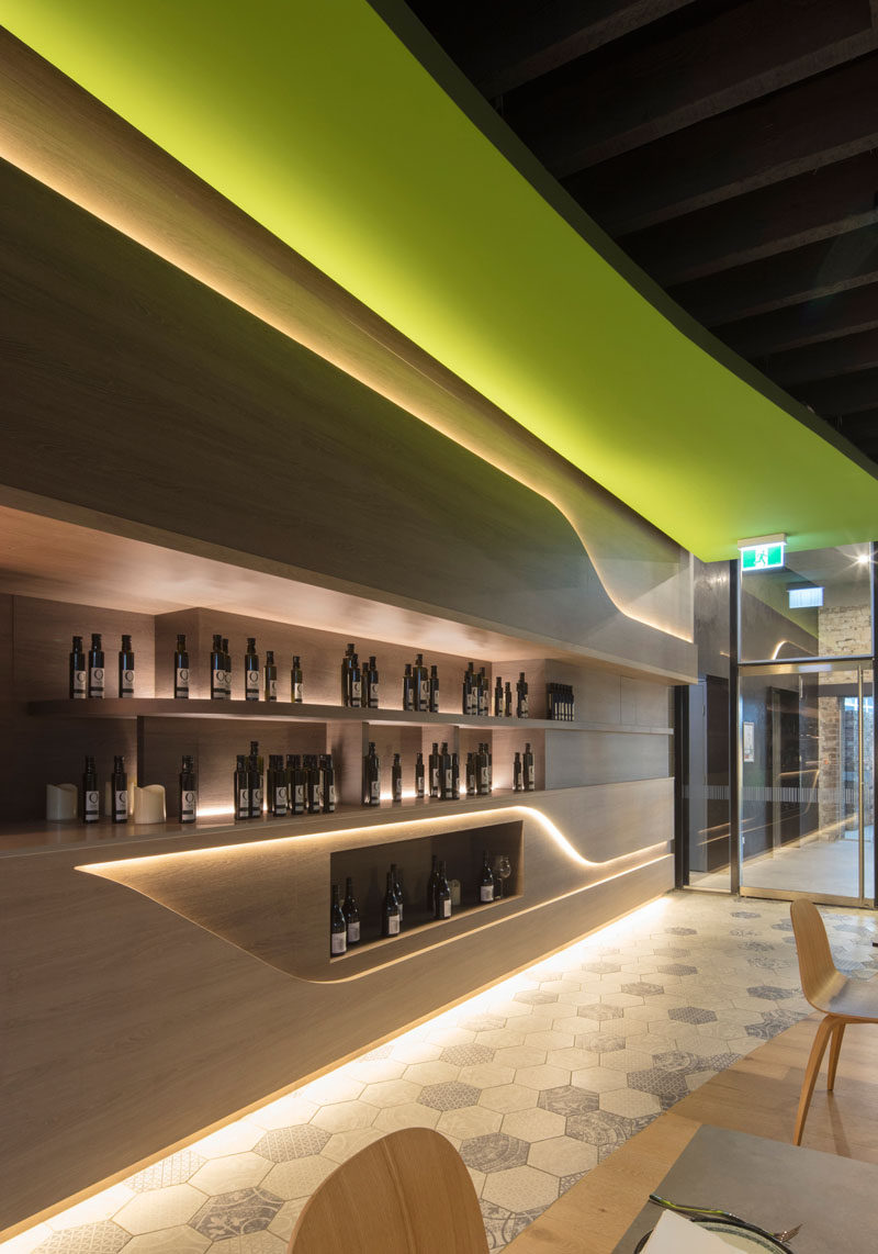 Design firm LAVA have designed Olio, a Sicilian restaurant in Sydney, that uses recessed LED lights to highlight various areas throughout the restaurant and create a nice warm modern glow.