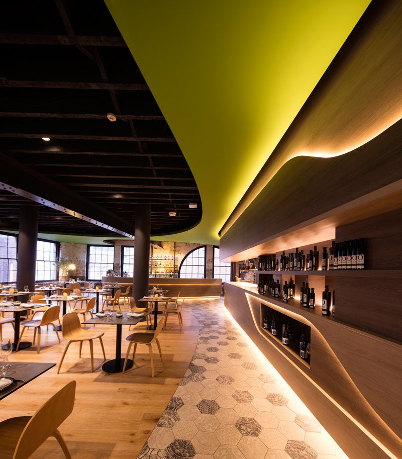 Design firm LAVA have designed Olio, a Sicilian restaurant in Sydney, that uses recessed LED lights to highlight various areas throughout the restaurant and create a nice warm modern glow.