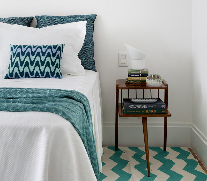 Bedroom Decor Ideas And Inspiration - This apartment bedroom designed by Yamagata Architecture uses just two main colors, teal and white, to create a bright, fun and colorful bedroom