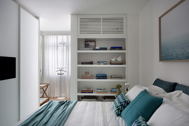 Bedroom Decor Ideas And Inspiration - This apartment bedroom designed by Yamagata Architecture uses just two main colors, teal and white, to create a bright, fun and colorful bedroom