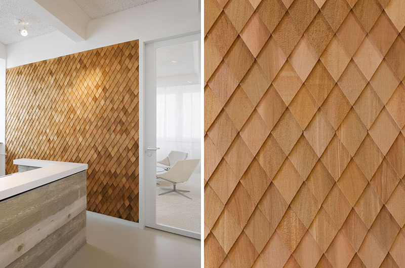 Interior Design Idea - In this contemporary office interior, the designers used wooden shingles on various wall panels to act as accent walls and to help create texture in the space.