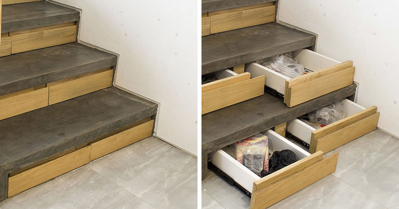 This concrete and wood staircase in a modern Indonesian house, has hidden stair storage within the concrete risers, ideal for bags, jackets and shoe storage