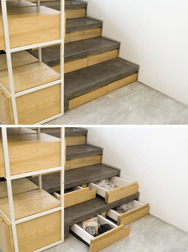 This concrete and wood staircase in a modern Indonesian house, has hidden stair storage within the concrete risers, ideal for bags, jackets and shoe storage