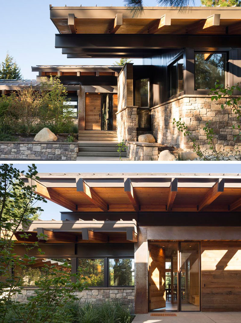 At the front of this modern wood cabin you're greeted by stone work leading up to the wood front door. Just inside the front door, a small contained room offers a place to leave shoes, greet guests, and makes sure that excessively cold or warm days don't affect the main living area of the cabin.