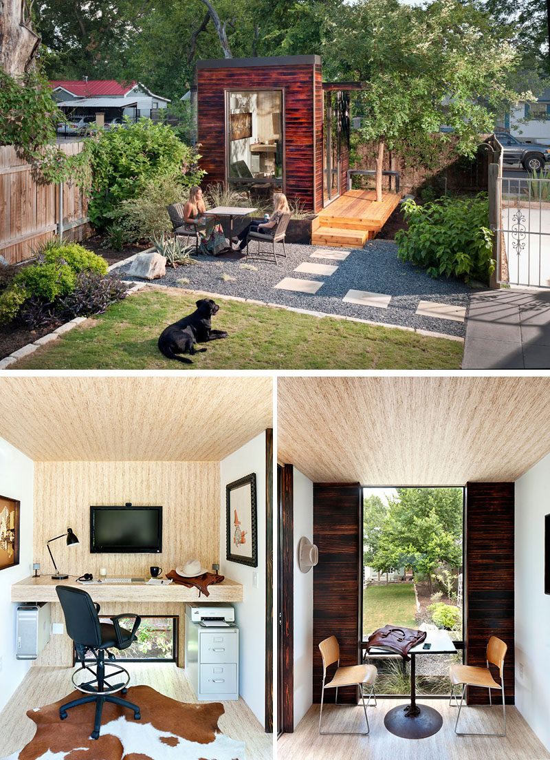 A backyard home office covered in charred wood siding. 