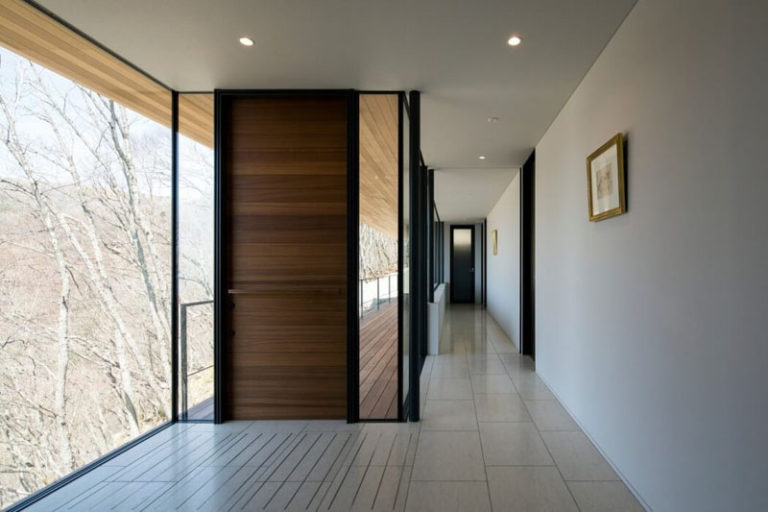 These 13 Sophisticated Modern Wood Door Designs Add A Warm Welcome