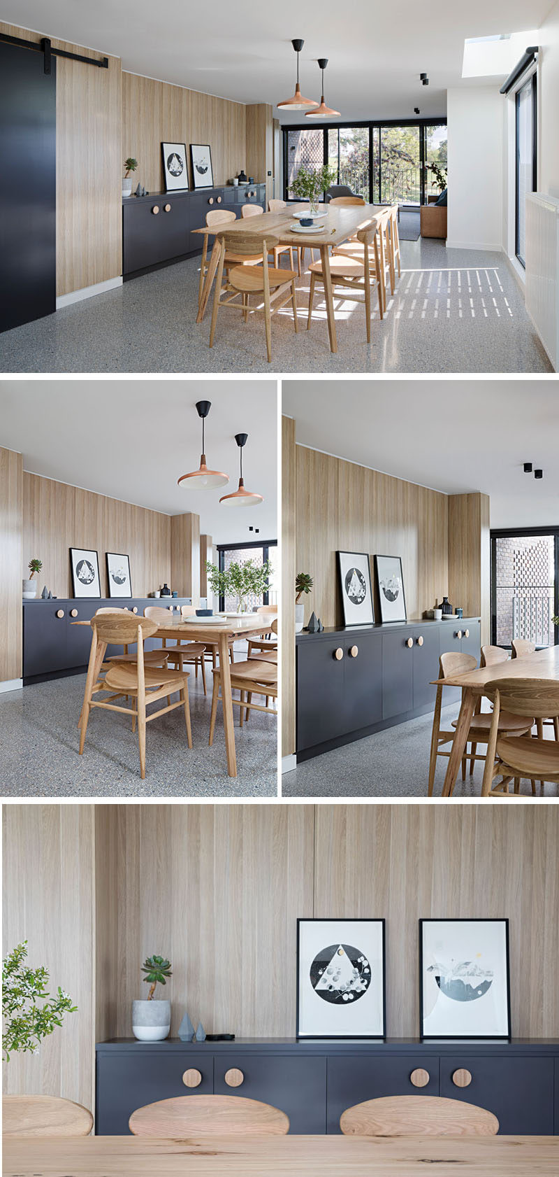 In this modern dining room, light wood dining table and chairs play off the light wood walls, and a matte black built-in sideboard with wood handles provides ample storage and a place to display decorative items.